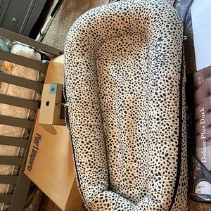 Brand new Dock A Tot never used in package